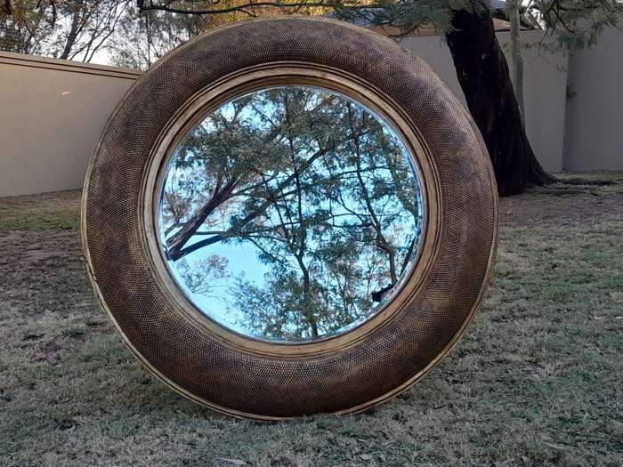 A Hang Gilded in Gold Leaf Bevelled Circular Mirror
