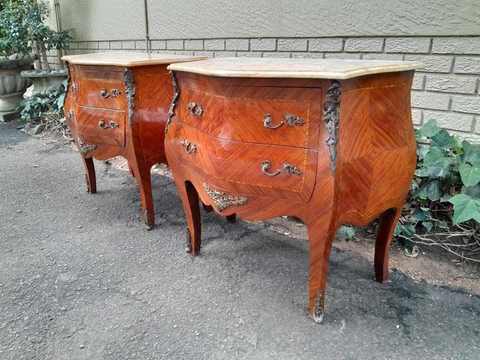 A 20th Century Pair of French Style Mahogany Bombe Pedestals with Marble Tops & Ormolu Mounts