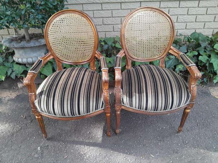 A Pair Of French Style Rattan And Carved Wooden Gilded Armchairs