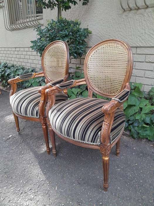 A Pair Of French Style Rattan And Carved Wooden Gilded Armchairs