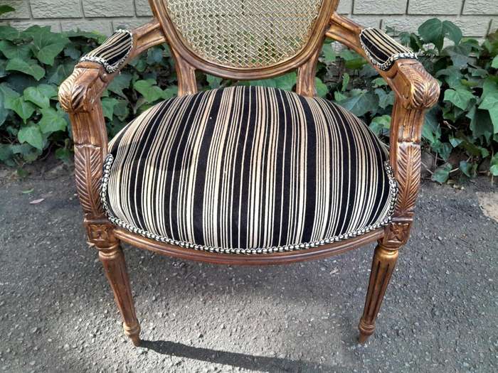 A Pair Of French Style Rattan And Carved Wooden Gilded Armchairs