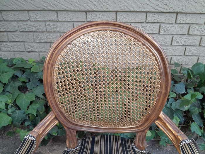 A Pair Of French Style Rattan And Carved Wooden Gilded Armchairs