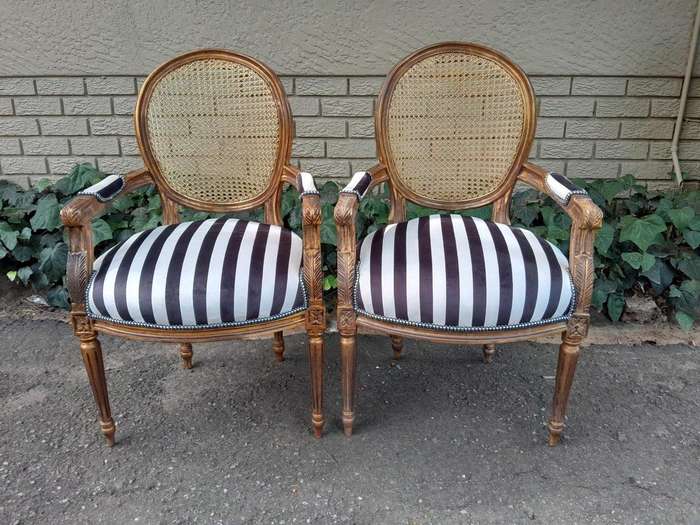 A Pair Of French Style Rattan And Carved Wooden Gilded Armchairs