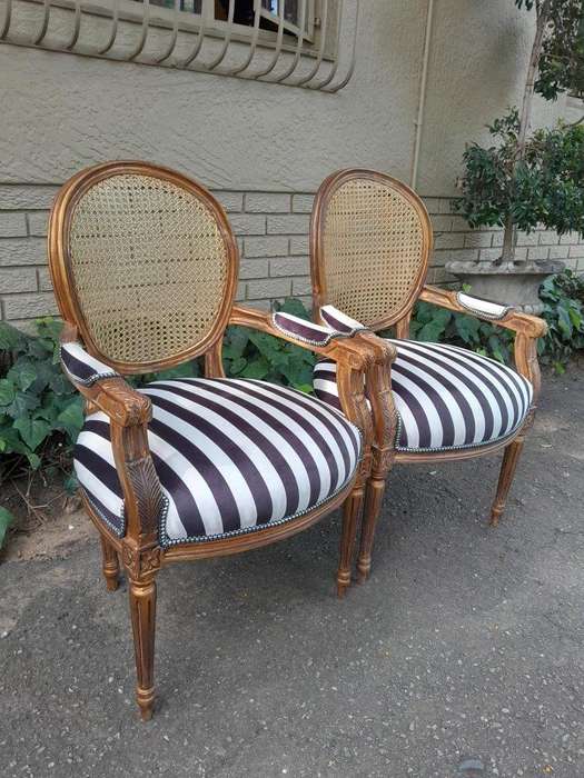 A Pair Of French Style Rattan And Carved Wooden Gilded Armchairs