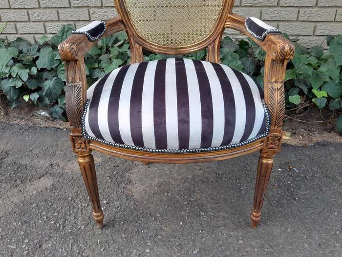 A Pair Of French Style Rattan And Carved Wooden Gilded Armchairs