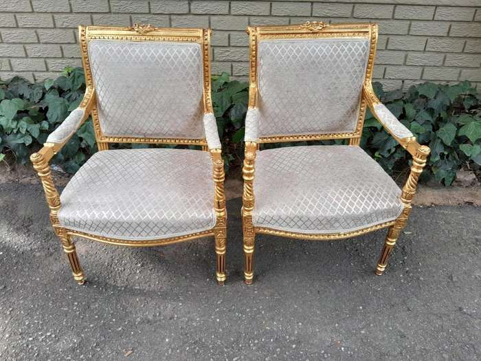 A Pair Of French Style Carved Wooden Gilded Armchairs