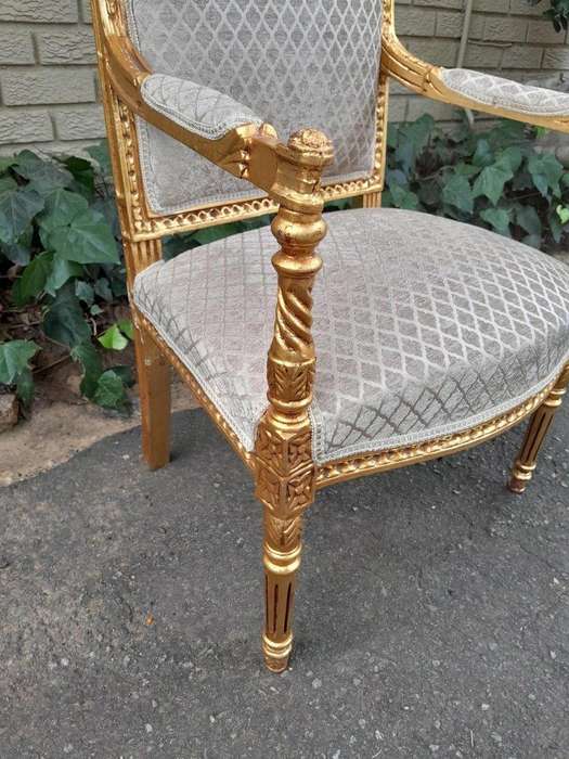 A Pair Of French Style Carved Wooden Gilded Armchairs