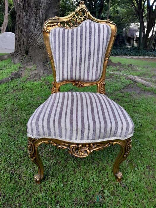 A Pair of French Rococo Style Carved Wooden Gilded Armchairs