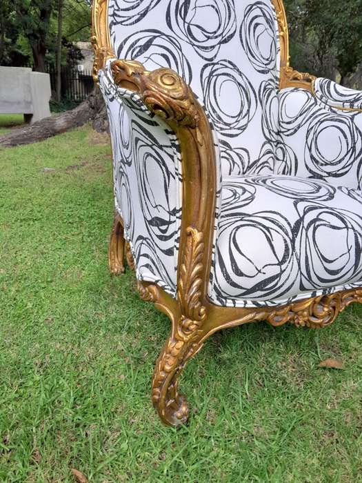 A 20th Century Pair of French Style Louis XVI Style Ornately Carved and Gilded Armchairs Upholste...