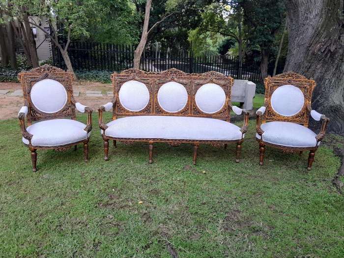 A 20th Century French Louis XVI Style Five Piece Set of Giltwood Settee and Four Armchairs