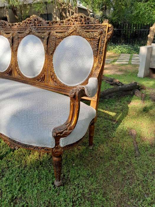 A 20th Century French Louis XVI Style Five Piece Set of Giltwood Settee and Four Armchairs