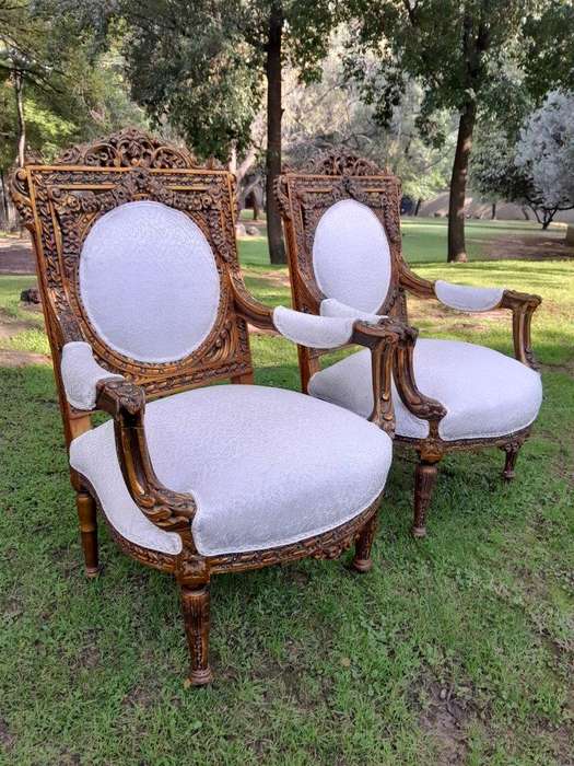 A 20th Century French Louis XVI Style Five Piece Set of Giltwood Settee and Four Armchairs