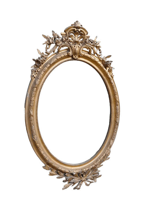 A French Style Ornately Carved and Gilded Bevelled Mirror
