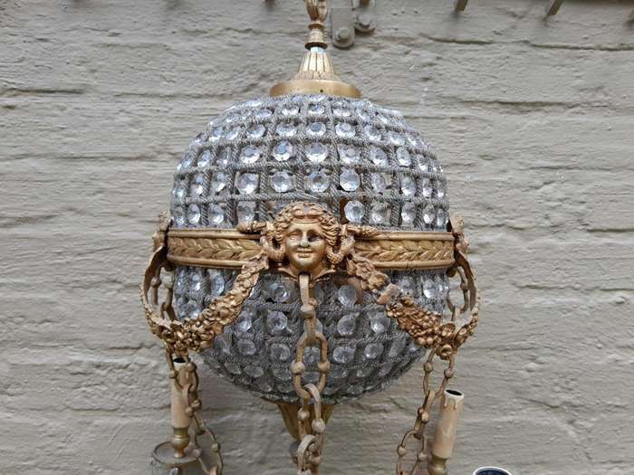 A 20th Century Brass Gilt Monumental Empire French Style Chandelier with Crystals