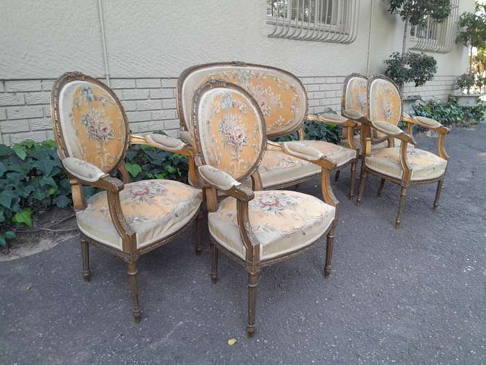 A 19th Century Antique French Giltwood Set Comprising a Settee and Four Medallion Armchairs uphol...