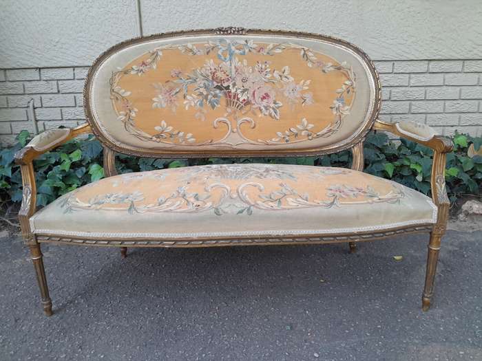 A 19th Century Antique French Giltwood Set Comprising a Settee and Four Medallion Armchairs uphol...