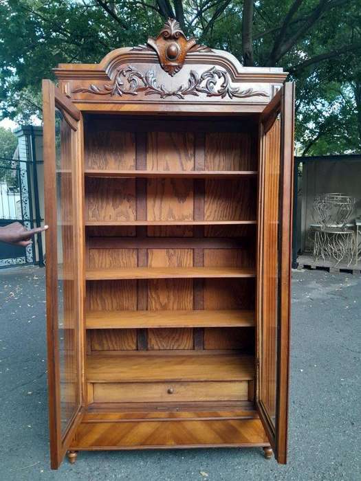 A 19th Century French Rococo Style Bookcase with Bevelled Glass, Shelves and Two Drawers