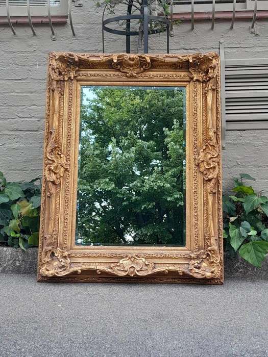 A 20th Century French Style Gilt Framed and Bevelled Mirror