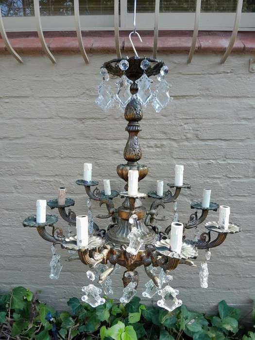 A 20th Century French Style Antique Brass and Crystal Twelve Light Chandelier