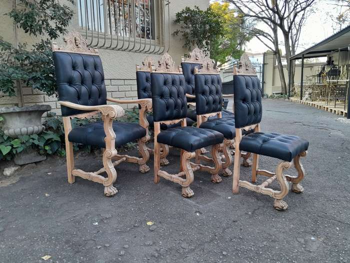 A 19th Century Spanish Heavily Carved Wooden Set of Six Mahogany Chairs (Comprises a Pair of Carv...