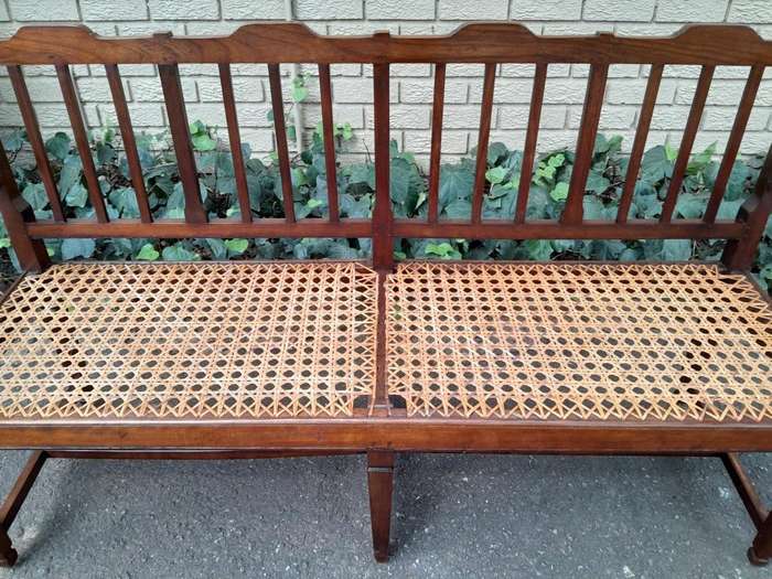 A 19th Century Cape Stinkwood Neo Classical Bench with Rattan Seat