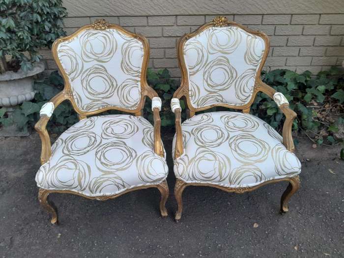 A 19th Century Pair of French Carved and Gilded Wooden Armchairs Upholstered in a Custom Made Fab...