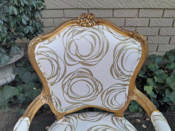 A 19th Century Pair of French Carved and Gilded Wooden Armchairs Upholstered in a Custom Made Fab...
