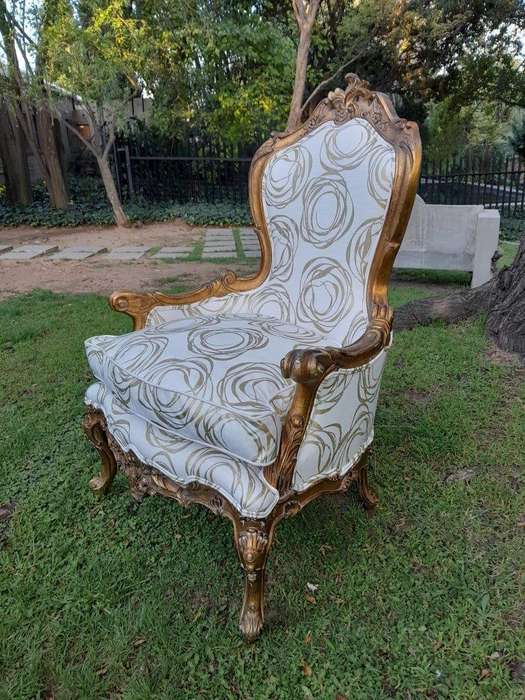 A 19th Century French Ornately Carved and Gilded Armchair of Large Proportion