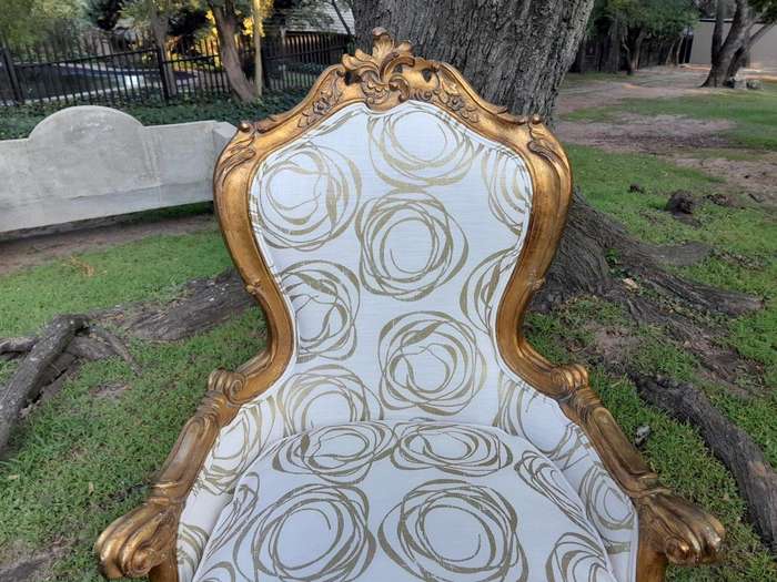 A 19th Century French Ornately Carved and Gilded Armchair of Large Proportion