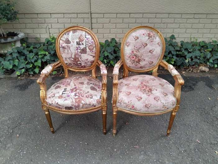 A 20th Century French Louis XVI Style Pair of Ornately Carved Gold Armchairs
