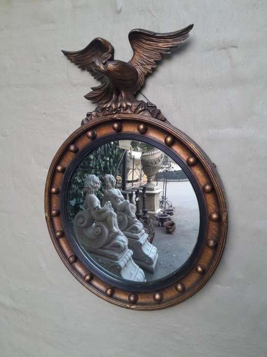 An Antique Regency Convex Eagle Mirror