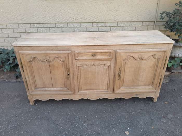 A 19th Century  Circa 1870 Carved Oak Side Board / Server With Drawer and Doors with Brass Mount...