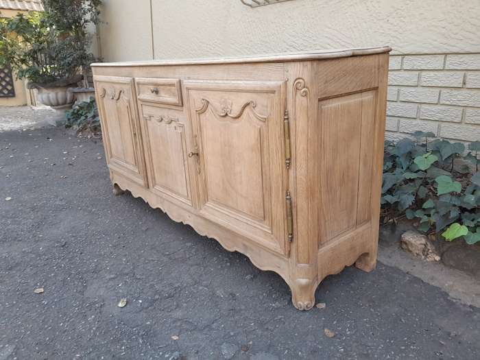 A 19th Century  Circa 1870 Carved Oak Side Board / Server With Drawer and Doors with Brass Mount...