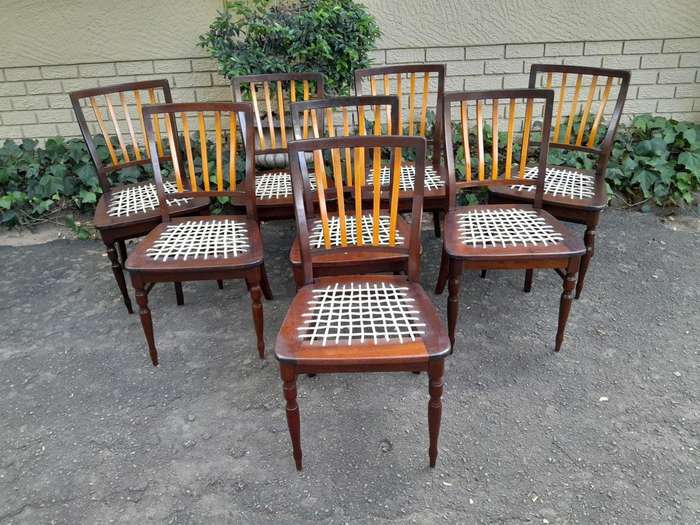 A Late 19thCentury  Early 20th Century Yellowwood Dining Table  with A 20th Century Set of Eigh...