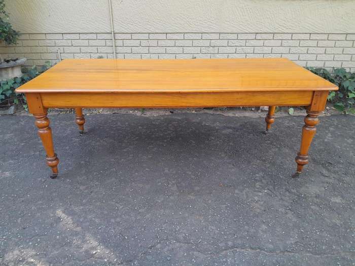 A Late 19thCentury  Early 20th Century Yellowwood Dining Table  with A 20th Century Set of Eigh...