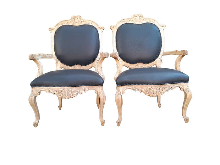 A 20th Century Pair Of French Style Carved Oak Armchairs In A Contemporary Bleached Finish And Up...