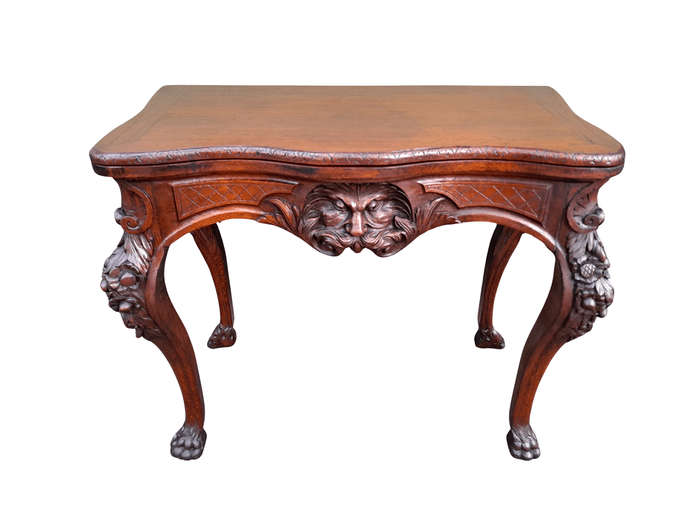 An Antique Jacobean Ornately Carved Oak Card Table with Black Baize