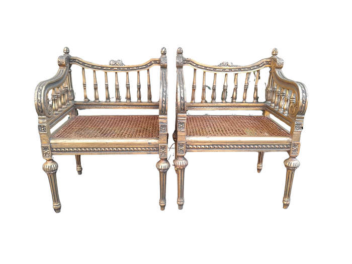 A 20th Century French Style Pair of Ornately Carved and Rattan Arm Chairs
