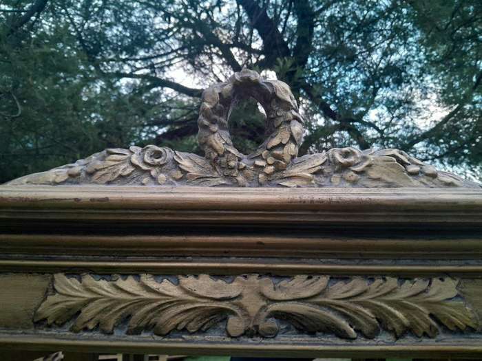 A 20th Century French Style Three Division and Large Ornately Carved and Hand-Gilded Display Cabi...