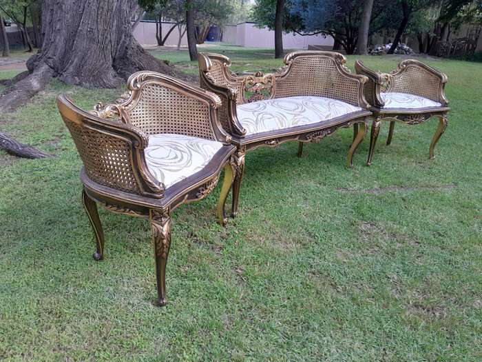 A 20TH Century French Louis XVI Style Giltwood Rattan Settee and Two Matching Bergere Chairs Upho...