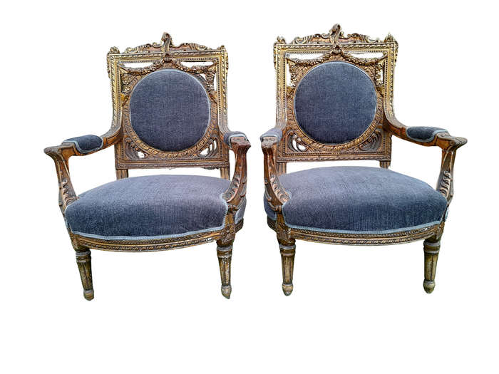 A Pair Of 20th Century French Style Ornately Carved Gilt Wood Arm Chairs