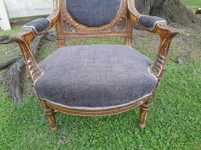 A Pair Of 20th Century French Style Ornately Carved Gilt Wood Arm Chairs