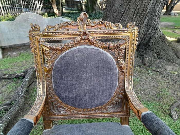 A Pair Of 20th Century French Style Ornately Carved Gilt Wood Arm Chairs