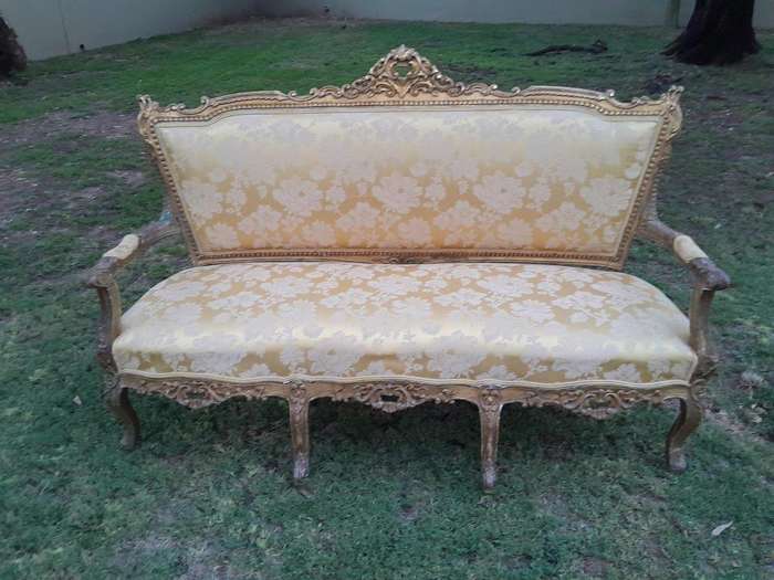 A 20th Century Circa 1950 French Style Ornately Carved Giltwood Settee
