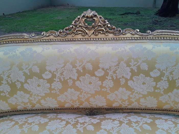 A 20th Century Circa 1950 French Style Ornately Carved Giltwood Settee