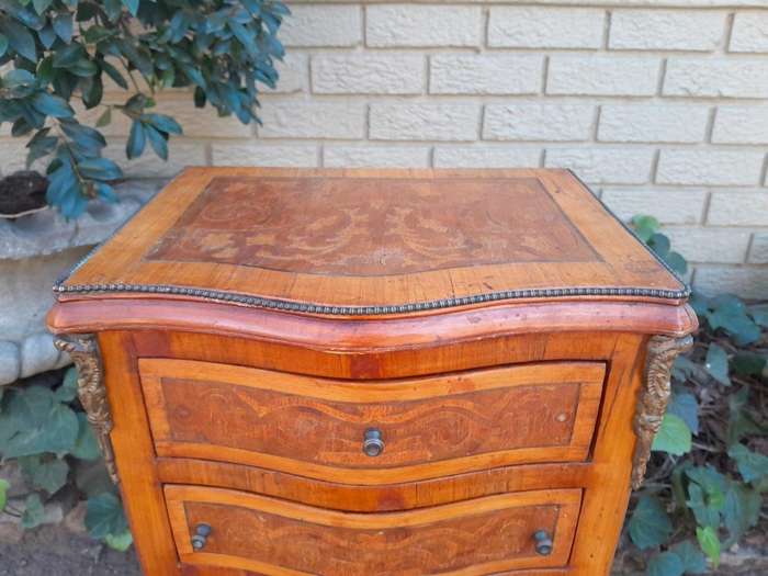 A 20th Century Circa 1920 Pair of French Walnut and Inlaid Bowfront Pedestals with Gilt Metal M...