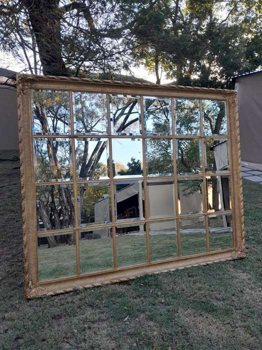 A French Style Heavily Carved and Gilded Framed Mirror with Bevelled Mirror Panes of Large Propor...