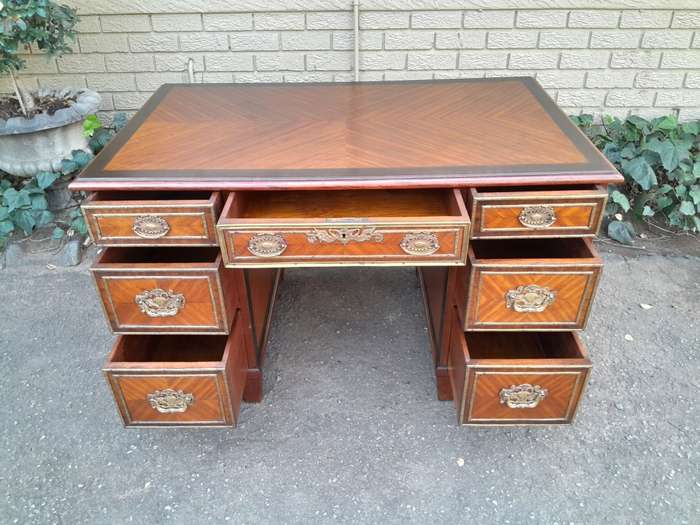 An Early 20th Century French Walnut And Gilt Mounted Desk