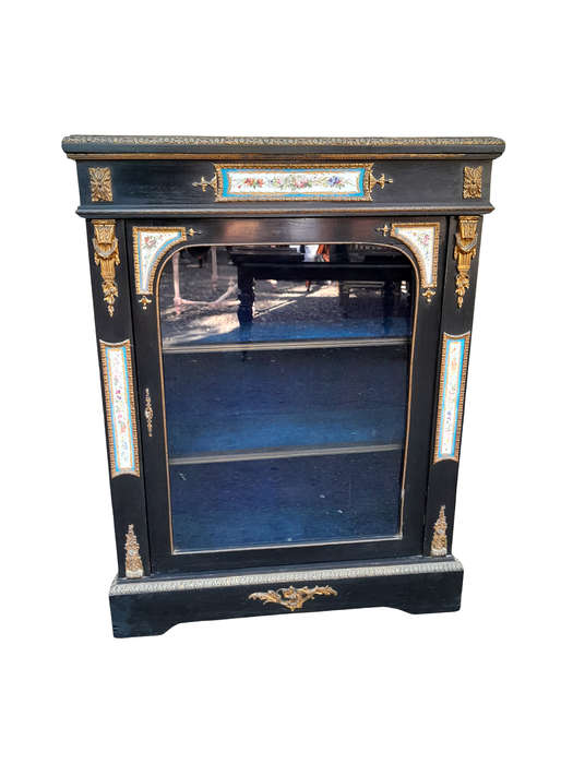 A 19th Century French Ebonised Pier Cabinet And Ormolu Mounts And Porcelain