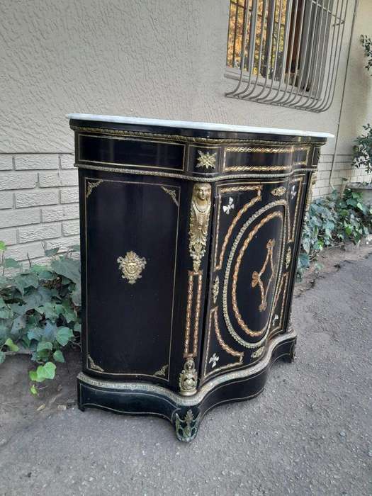 A 19th Century French Credenza With Marquetry Inlay. Mother Of Pearl And Ormolu And White Marble Top
